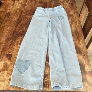 H&M girls pull on jeans with hearts